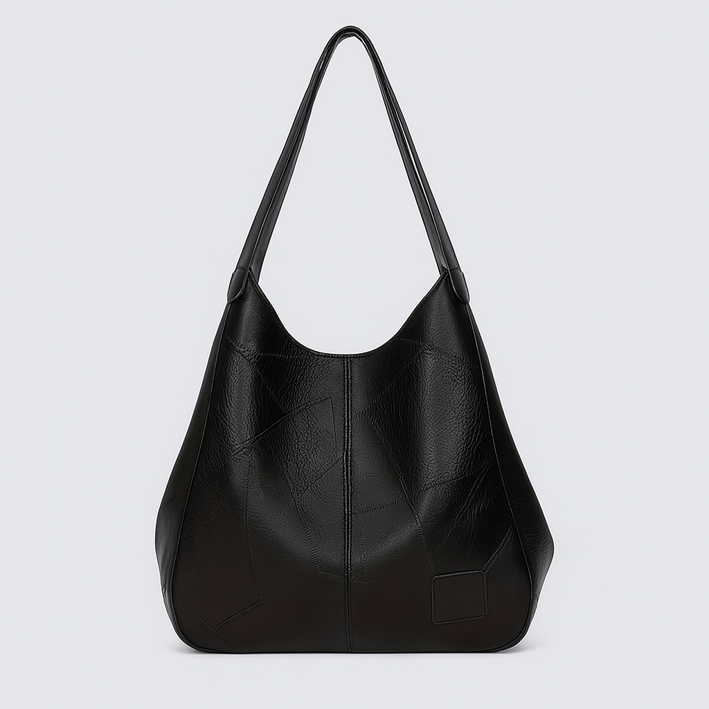 Large soft tote bag with a slouchy silhouette and double shoulder straps.
