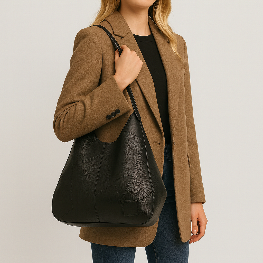 Large soft tote bag with a slouchy silhouette and double shoulder straps.